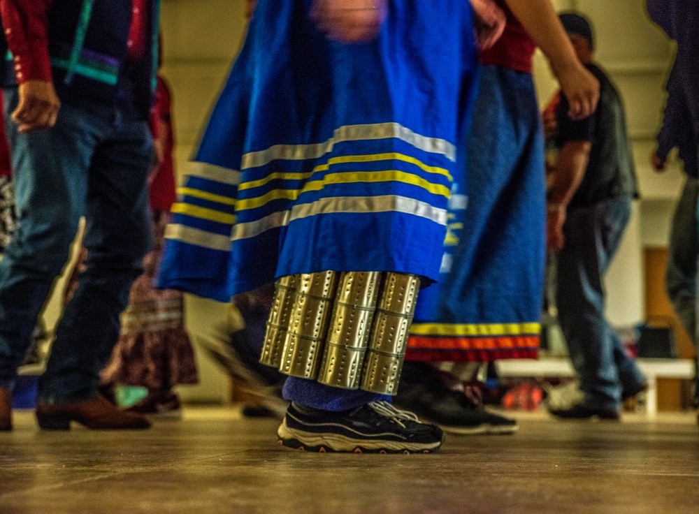 A woman with shaker cans during a dance