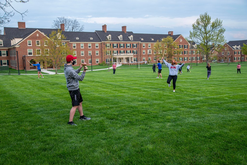 Myaamia Heritage Students practicing their peekitahaminki skills on Central Quad