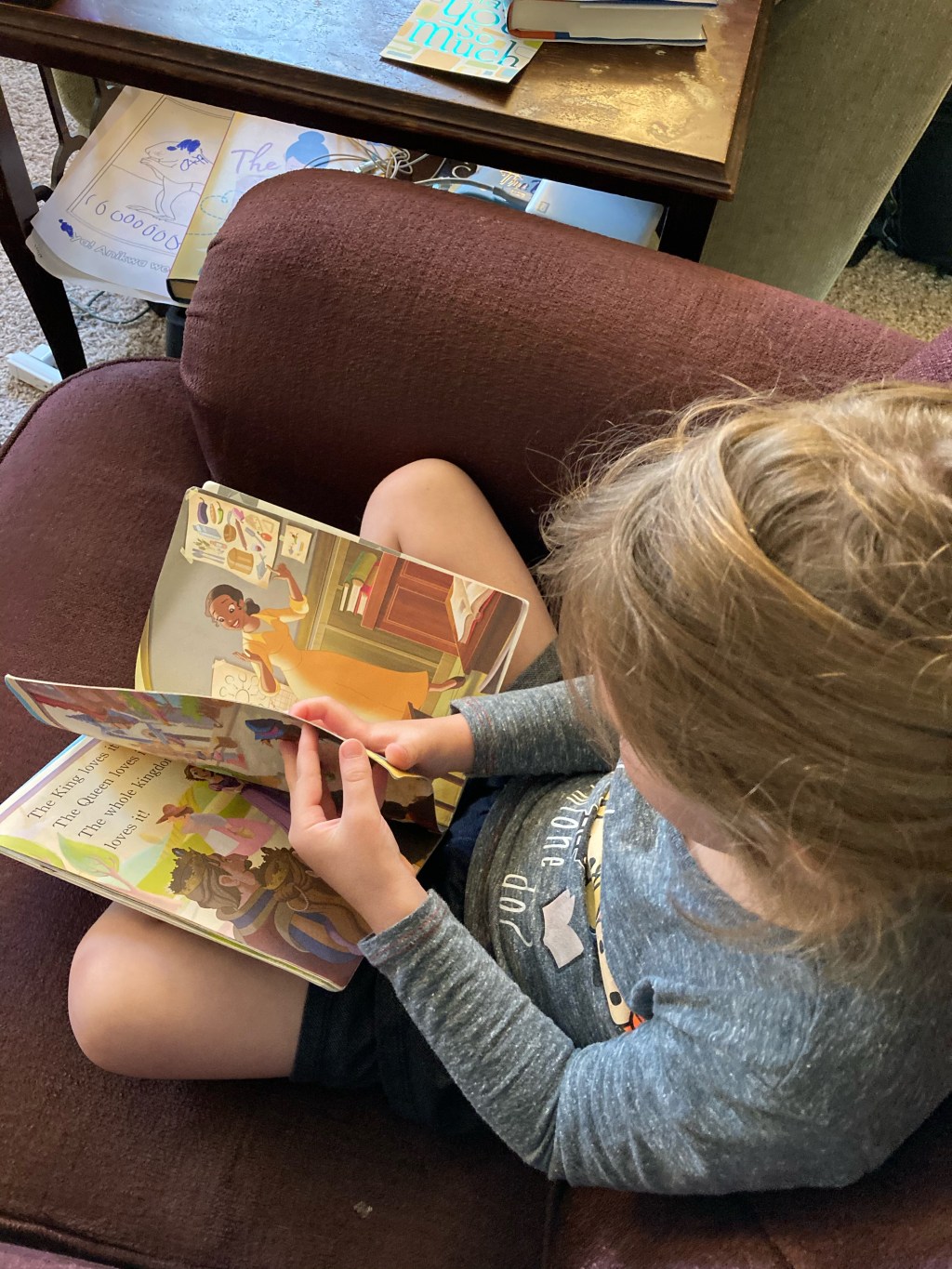 Small child reading a book