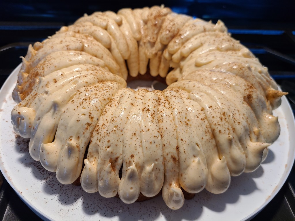A persimmon cake with a cinnamon persimmon cream cheese icing.