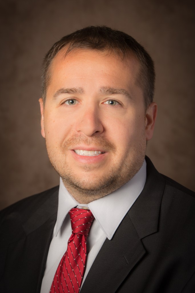 Professional headshot of Dr. Paul Branscum