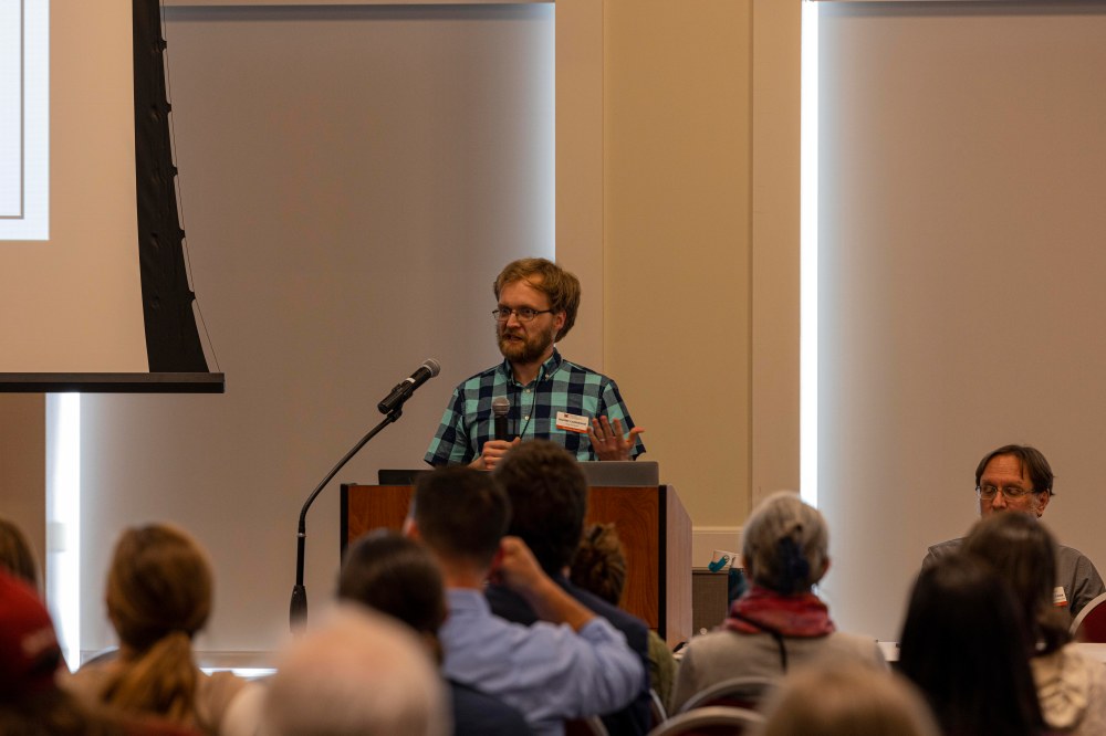 Dr. Hunter Thompson Lockwood presenting at a podium