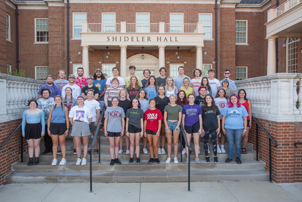 Group of 40 Myaamia students stand on the steps in front of Shideler Hall