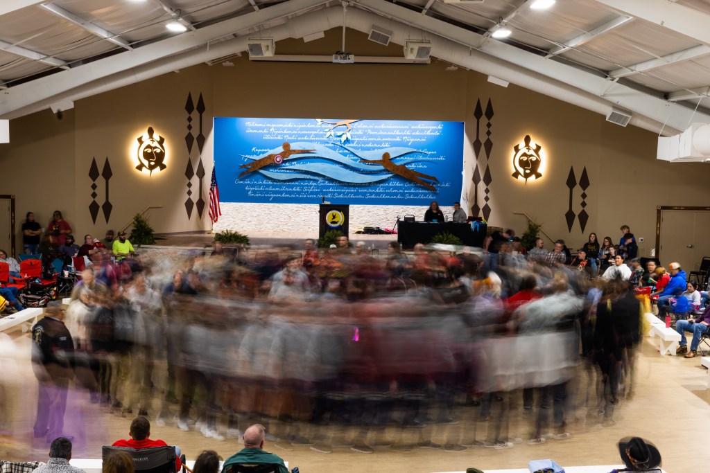 Blurred people capturing during a stomp dance