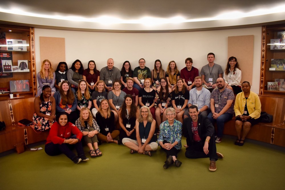 A group of people looking at the camera