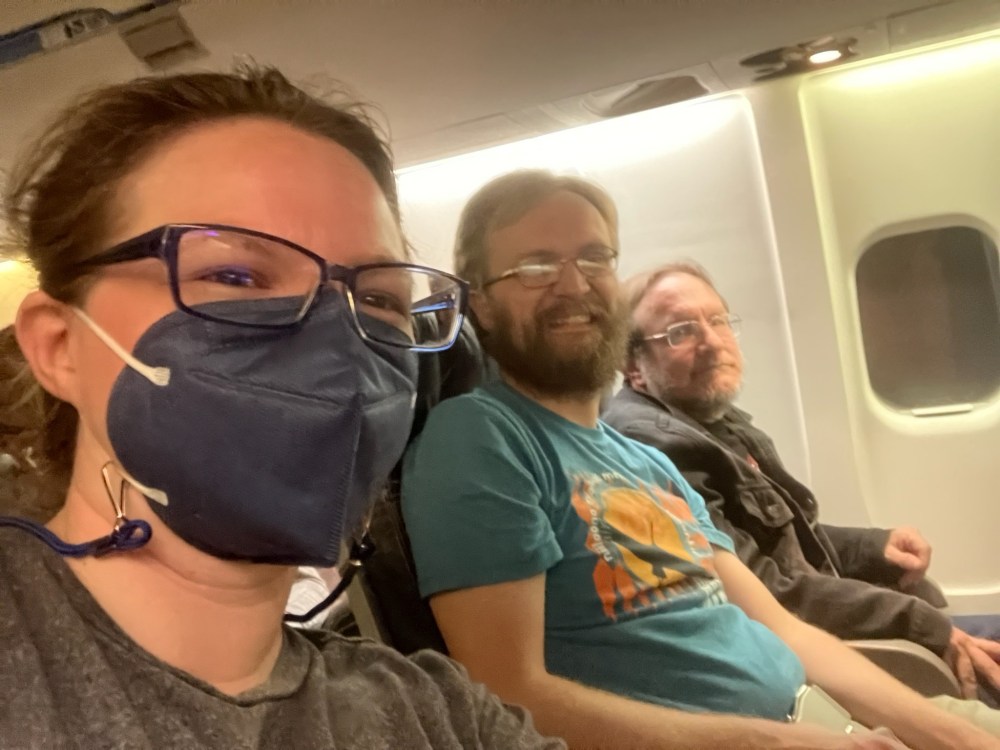 Three people on an airplane