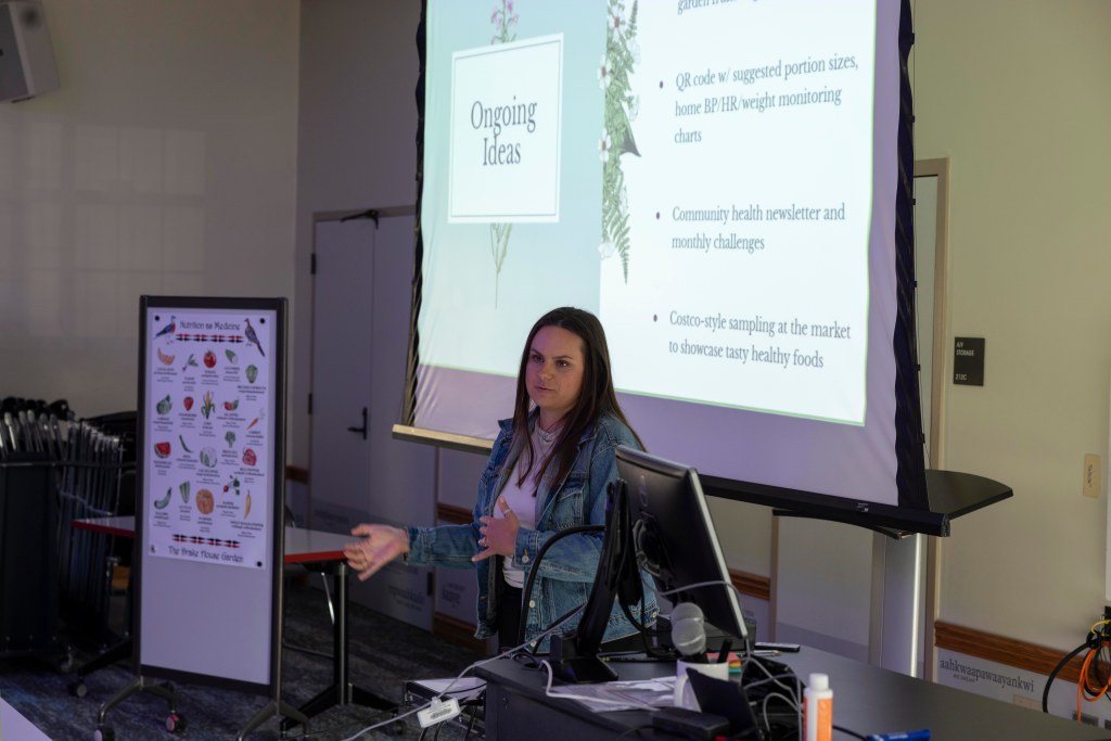 Courtney Drake presents her research project