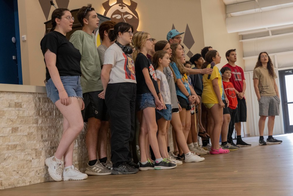 Youth participants sing in the Miami Tribe's council house