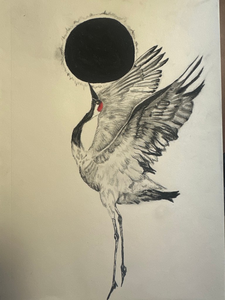 A crane looking up at the sun