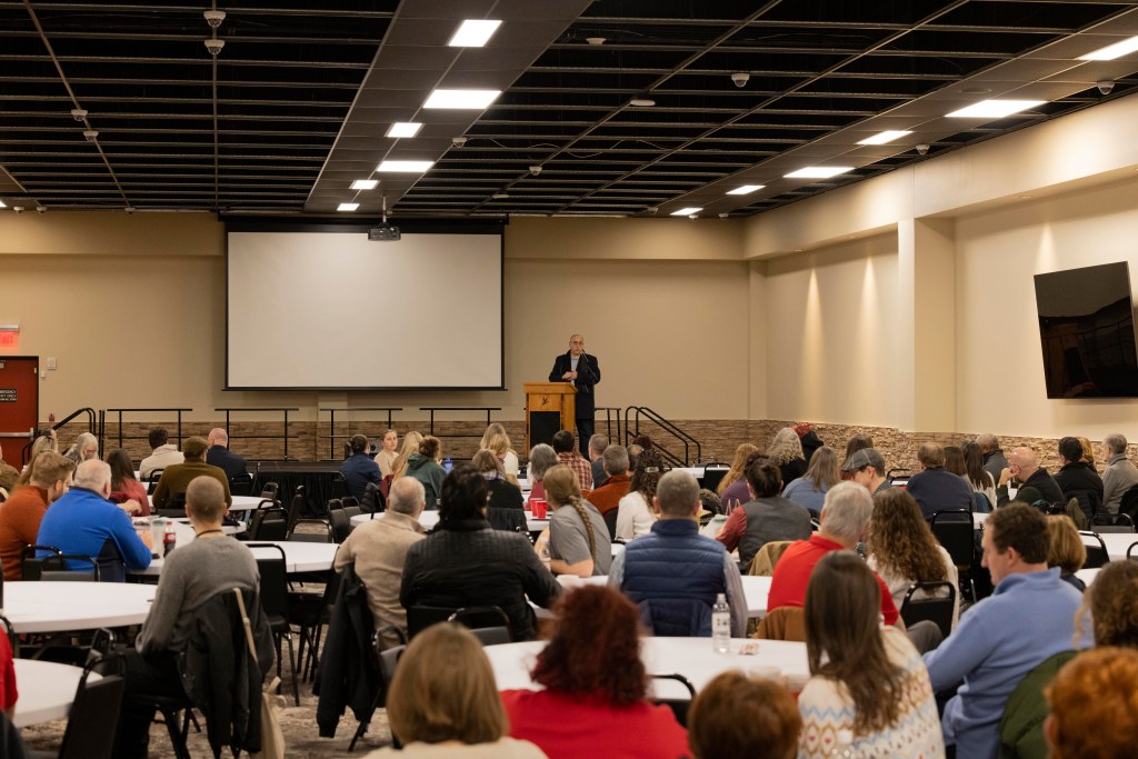 Akima Lankford welcomes a group of people
