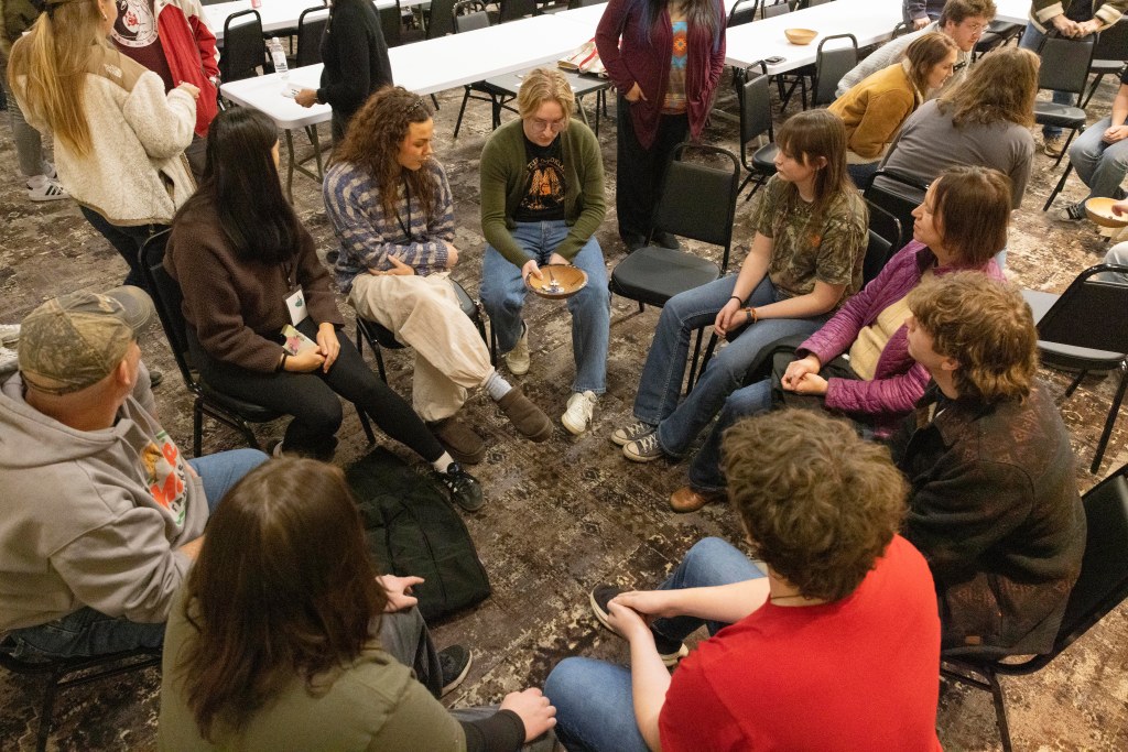 Sitting in a circle playing a game