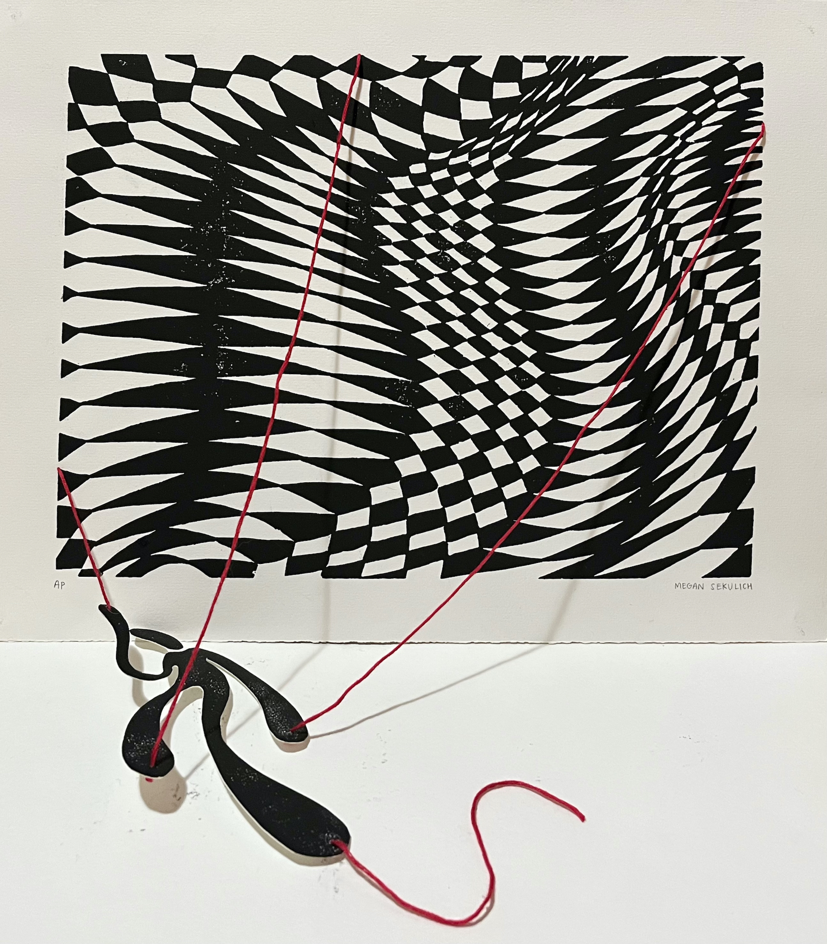 An elongated figure hanging from a distorted geometric pattern with red string