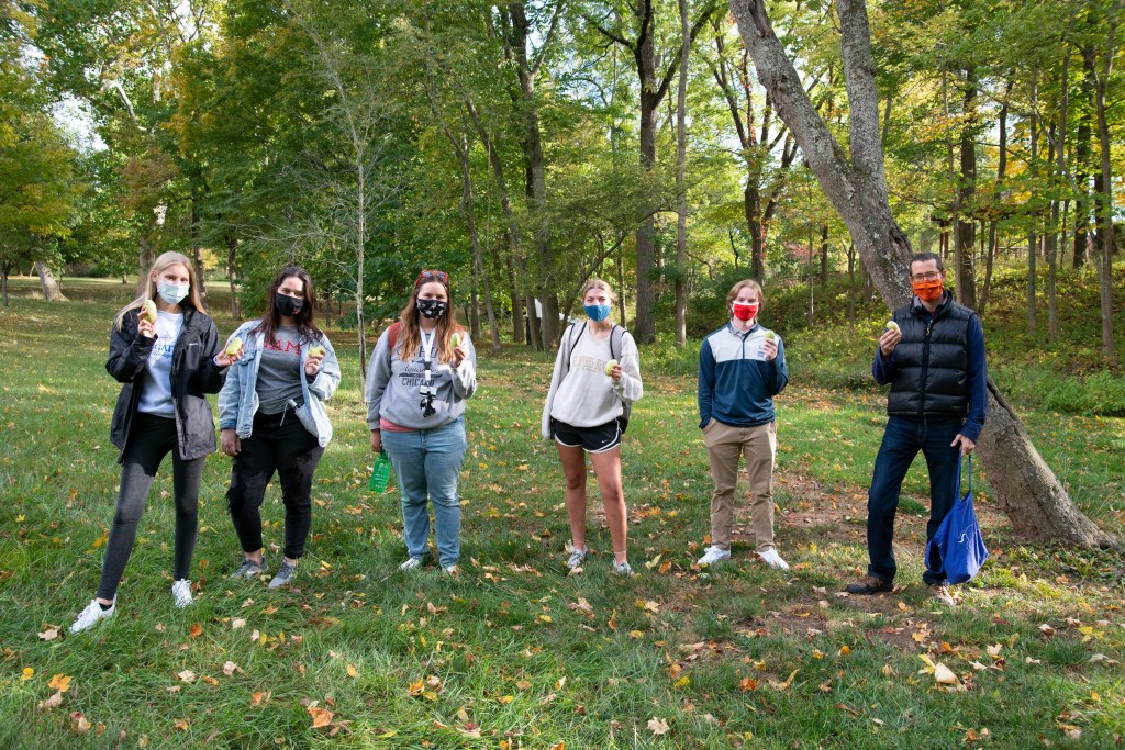 Heritage Students harvesting pawpaws
